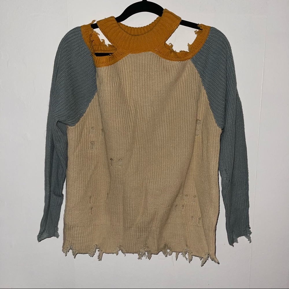 Buckle distressed cold shoulder sweater
